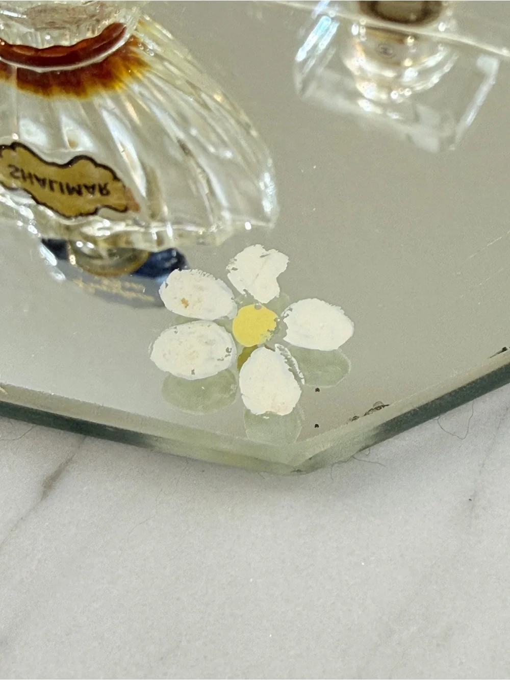 Vintage Frameless Handheld Vanity Mirror with Daisy